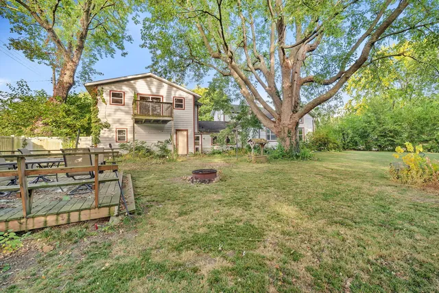 a backyard of a house with lots of green space