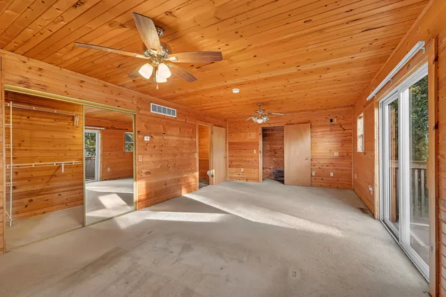 a view of empty room with windows