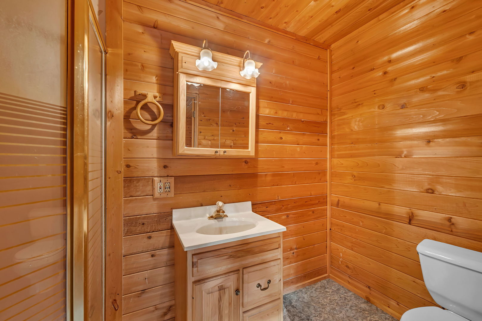 1636 North 4012th Road Earlville, IL 60518 - Photo 10 of 31 a bathroom with a sink toilet and shower