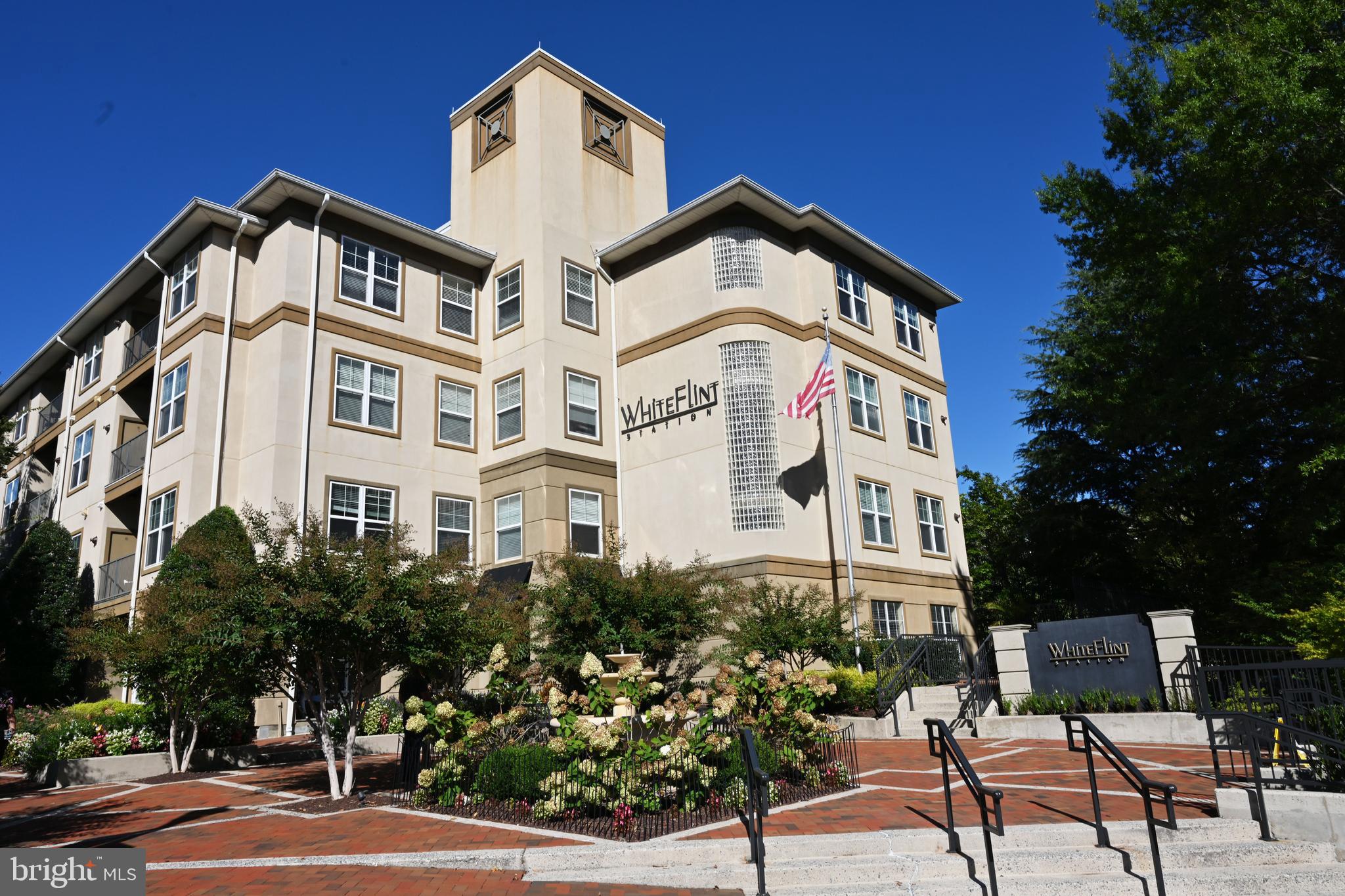 11800 Old Georgetown Road, Unit 1537 North Bethesda, MD 20852 - Photo 1 of 1 a view of a building with a bench