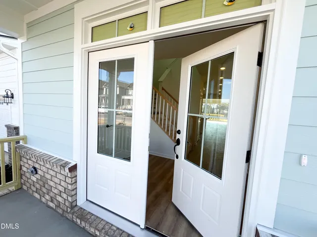 a view of balcony and wooden door