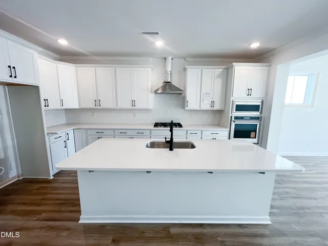 a view of a house with wooden floor