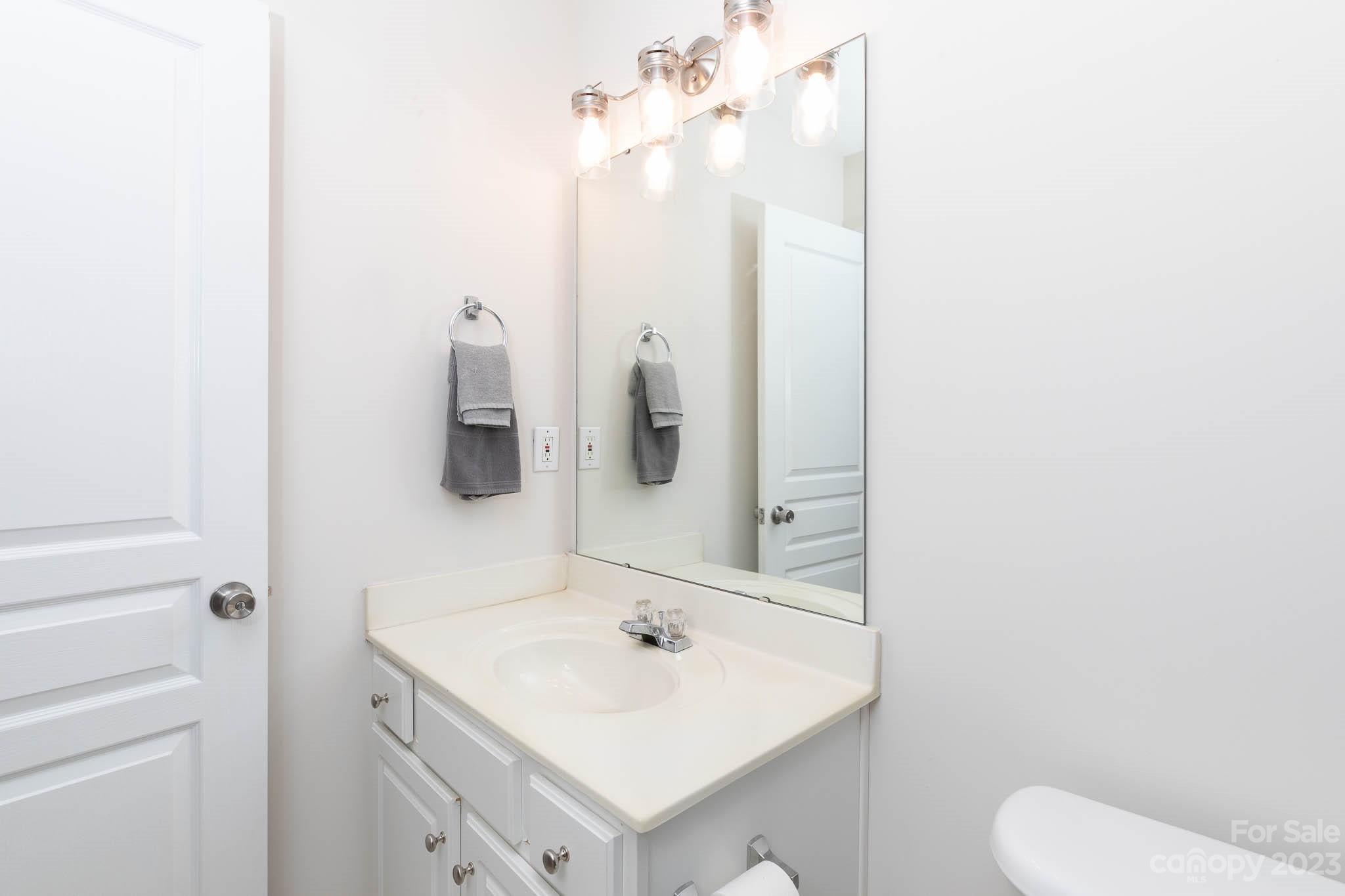2921 Sedona Place Fort Mill, SC 29708 - Photo 21 of 31 a bathroom with a sink toilet and mirror
