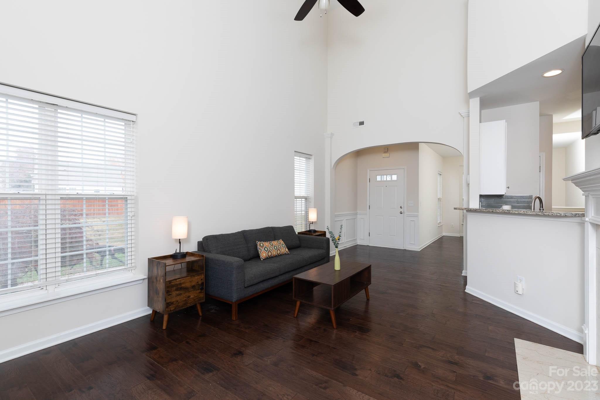 2921 Sedona Place Fort Mill, SC 29708 - Photo 7 of 31 a living room with furniture and a large window