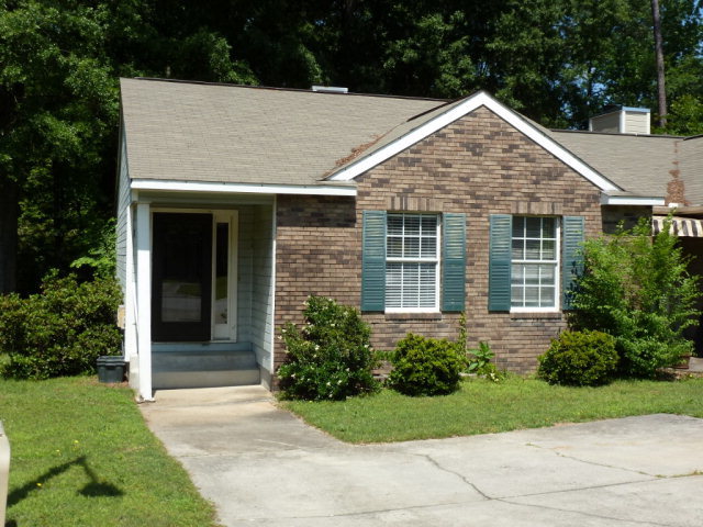 a view of a house with garden