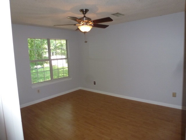 130 Wesleyan Way Macon, GA 31210 - Photo 5 of 9 an empty room with a window