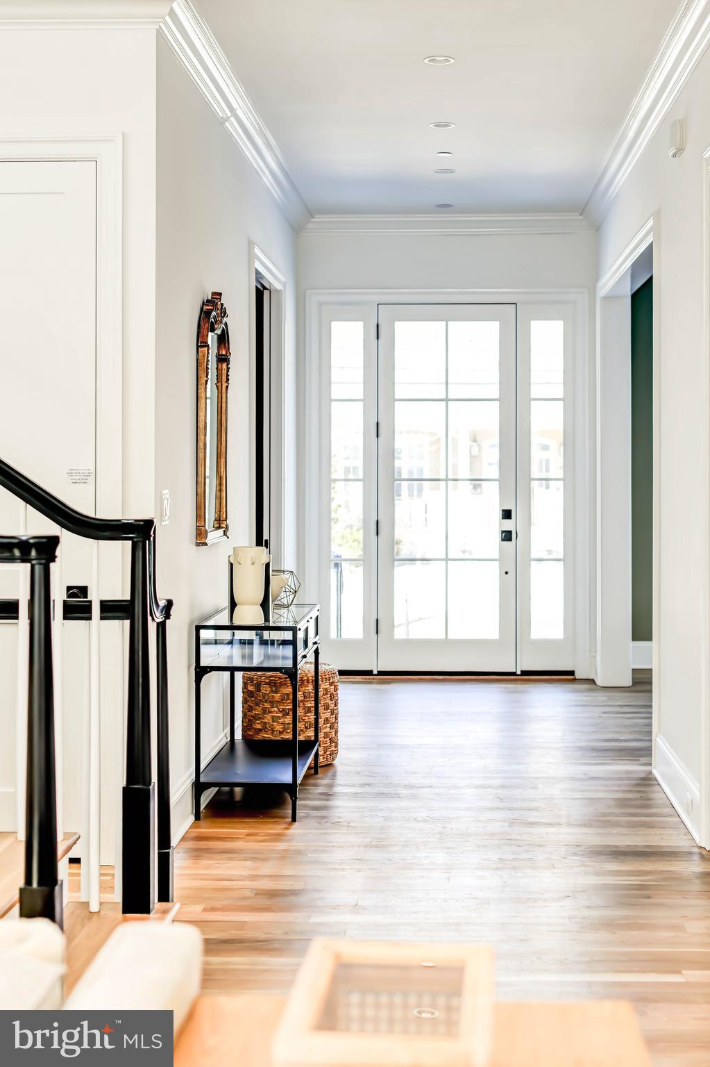 4422 Walsh Street Chevy Chase, MD 20815 - Photo 3 of 93 a living room with furniture and wooden floor