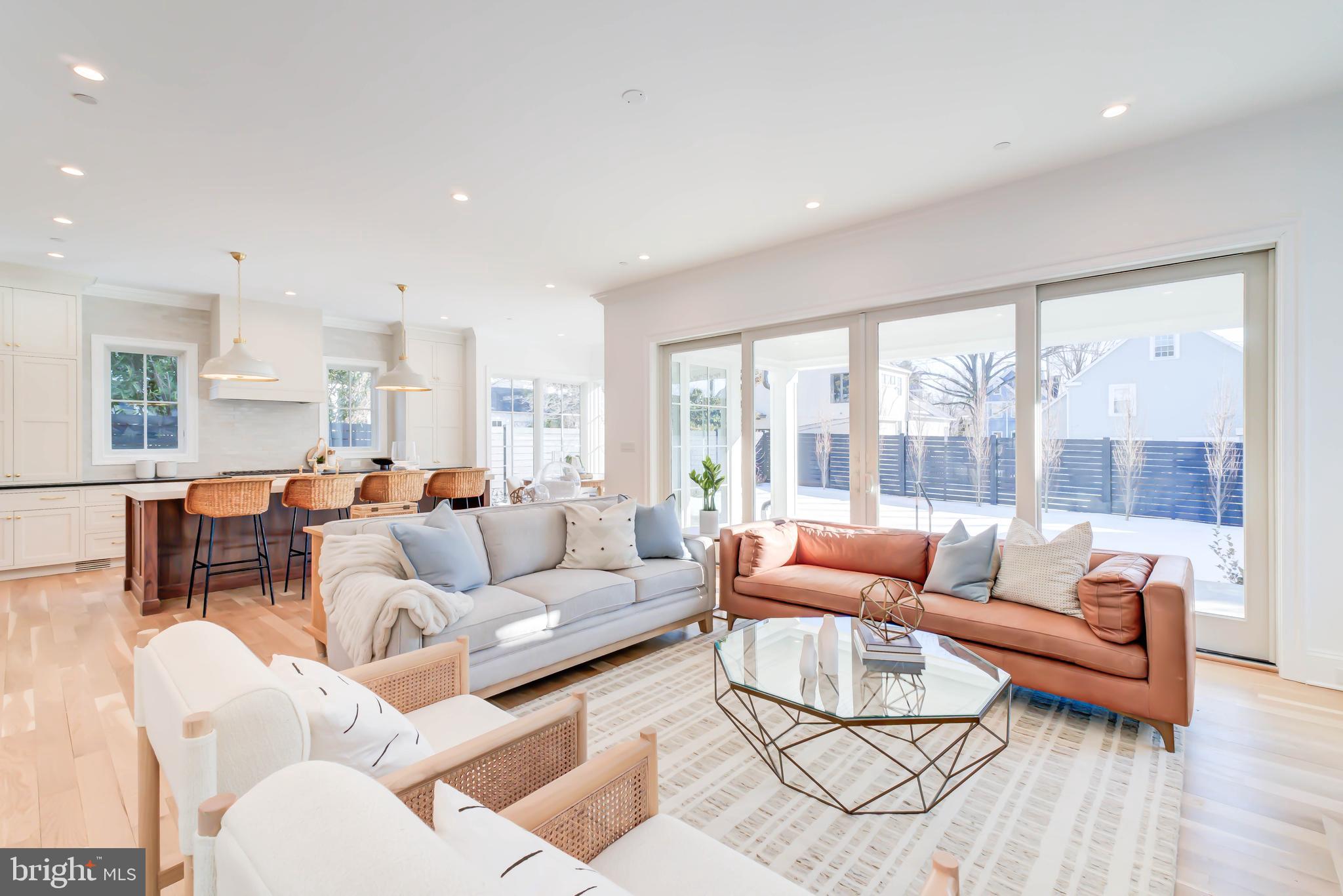 4422 Walsh Street Chevy Chase, MD 20815 - Photo 34 of 93 a living room with furniture and a large window