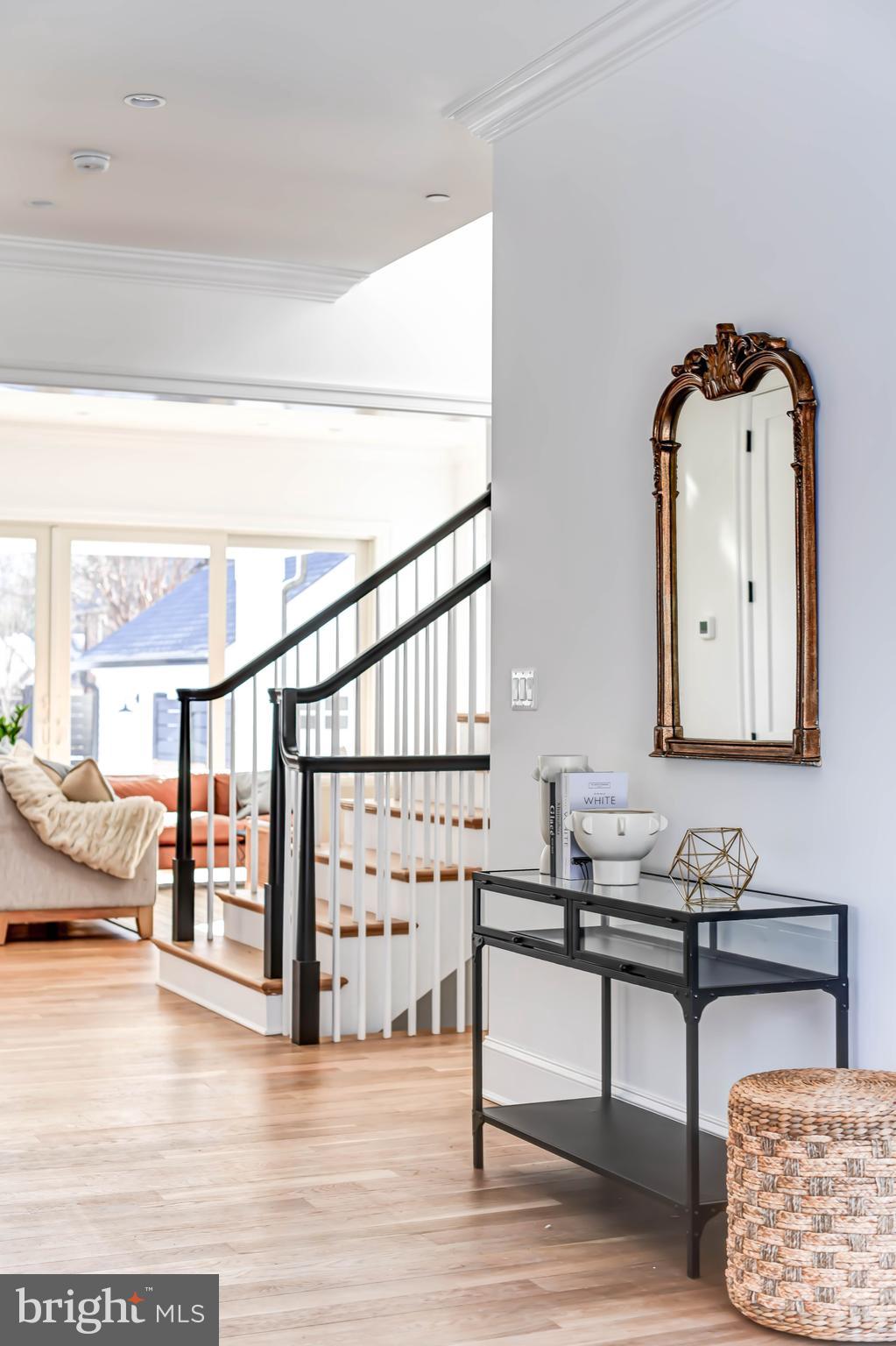 4422 Walsh Street Chevy Chase, MD 20815 - Photo 40 of 93 a living room with furniture and a wooden floor