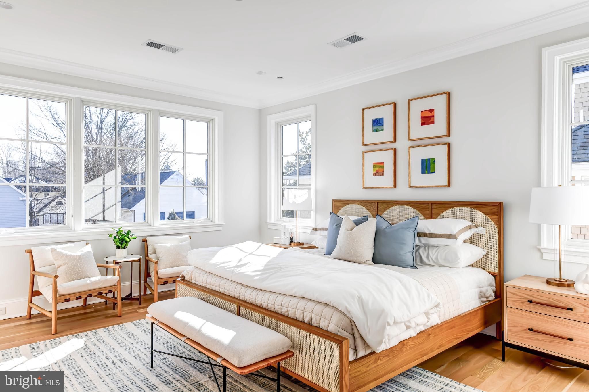 4422 Walsh Street Chevy Chase, MD 20815 - Photo 45 of 93 a bedroom with a bed and wooden floor