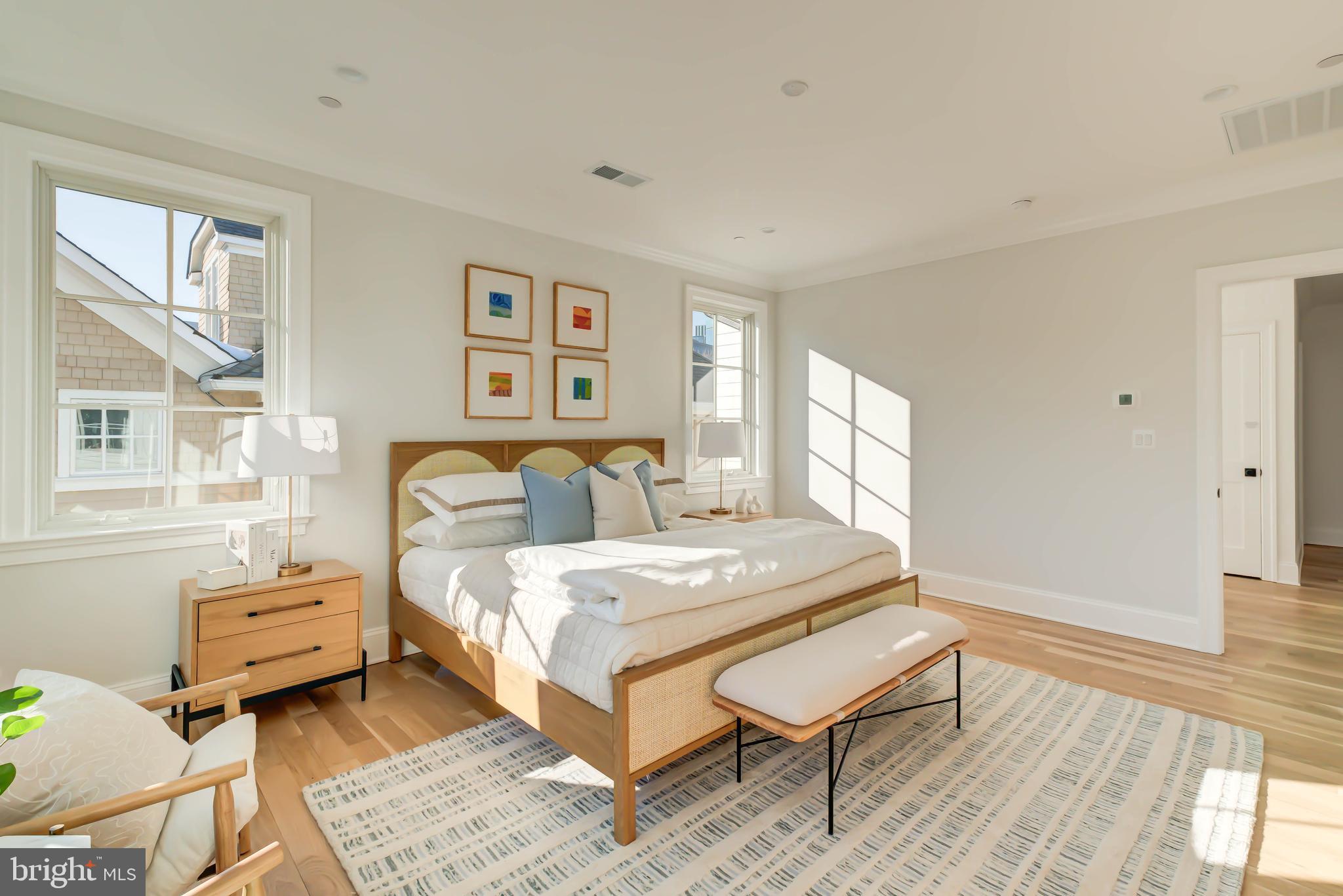 4422 Walsh Street Chevy Chase, MD 20815 - Photo 48 of 93 a bedroom with a bed and wooden floor