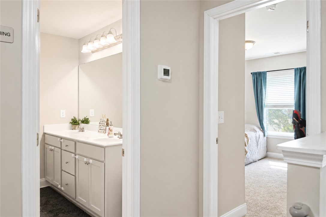 102 Ventura Street Anderson, SC 29621 - Photo 18 of 24 Twin vanities offer ample space in this well-appointed bathroom.