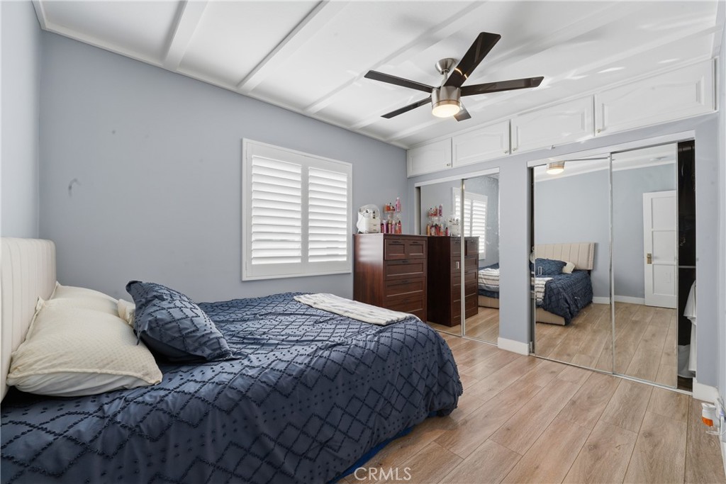 11340 Virginia Street Lynwood, CA 90262 - Photo 17 of 53 a bedroom with a bed and dresser