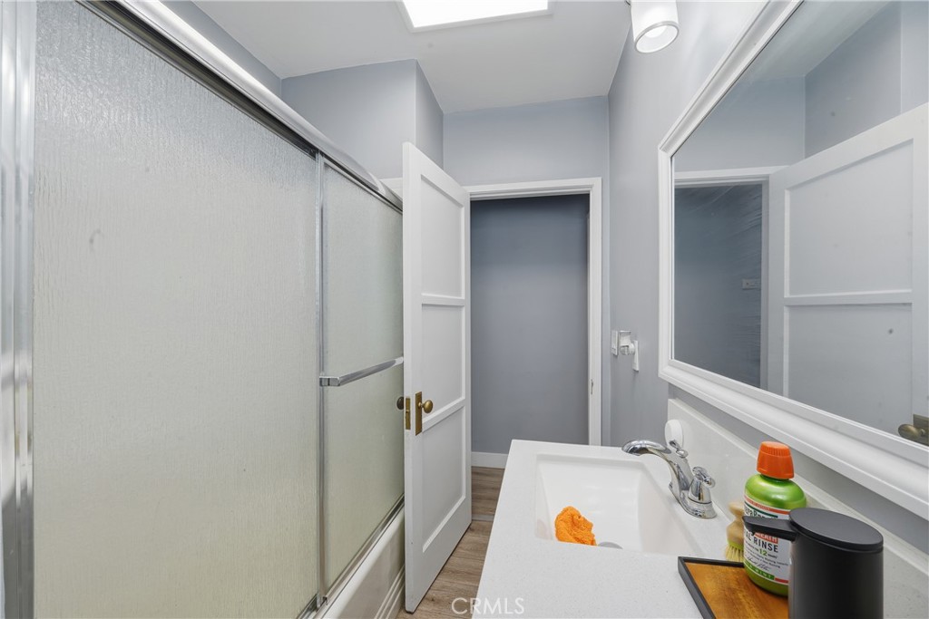 11340 Virginia Street Lynwood, CA 90262 - Photo 20 of 53 a bathroom with a tub and sink