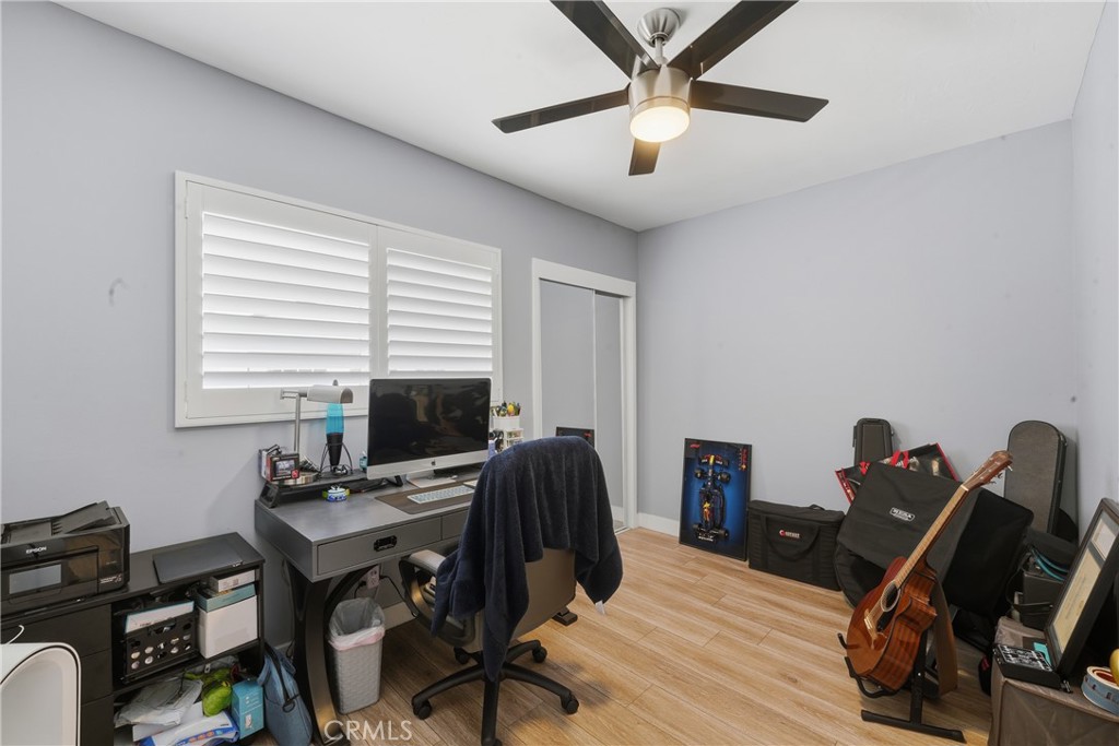 11340 Virginia Street Lynwood, CA 90262 - Photo 22 of 53 a view of a workspace with furniture and a window