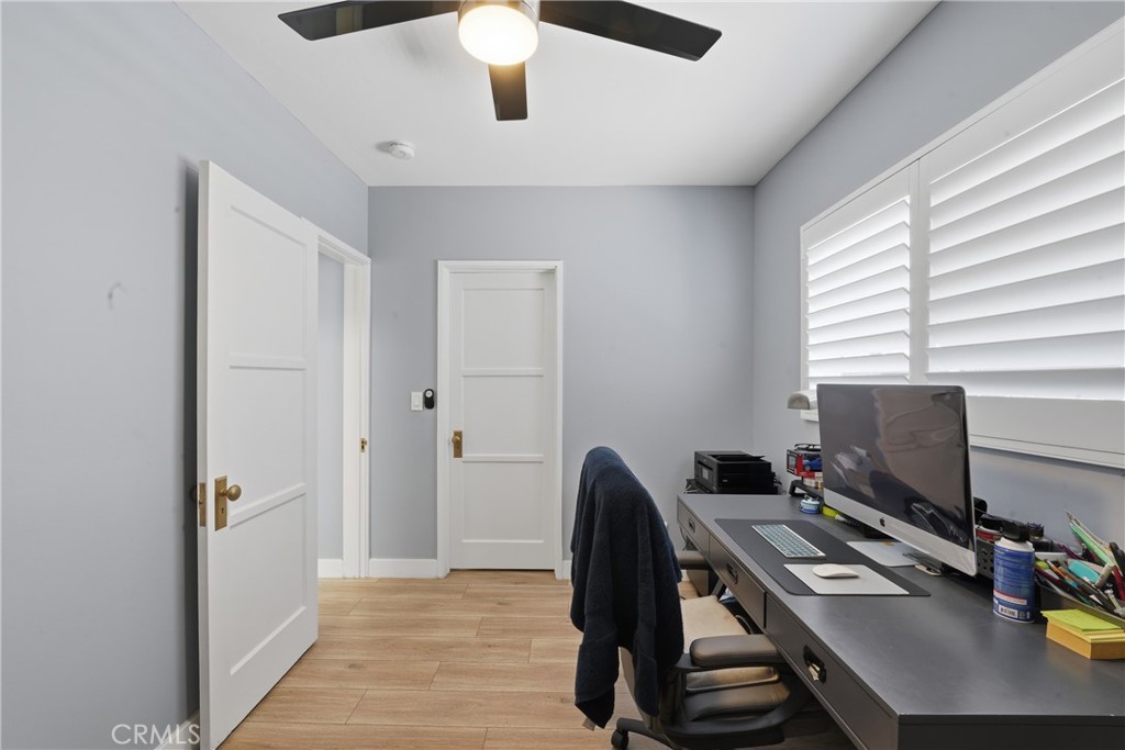11340 Virginia Street Lynwood, CA 90262 - Photo 23 of 53 a view of a workspace with furniture and a window