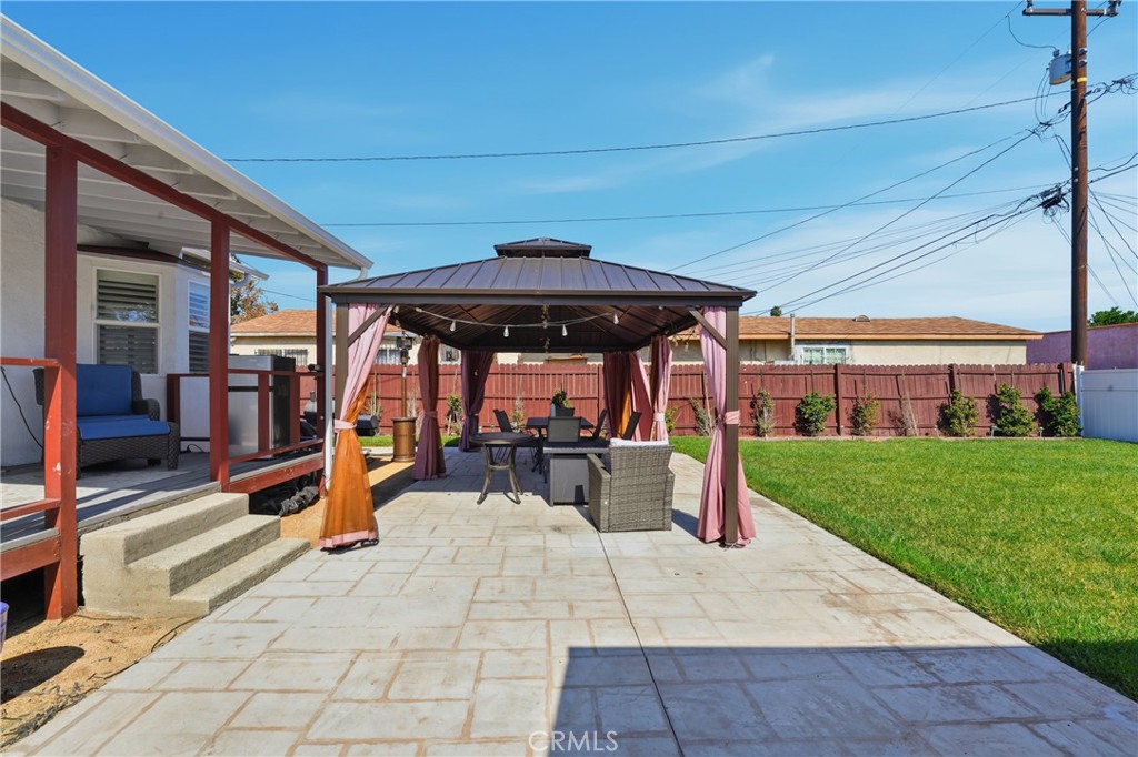 11340 Virginia Street Lynwood, CA 90262 - Photo 34 of 53 a view of outdoor space yard deck patio and outdoor kitchen