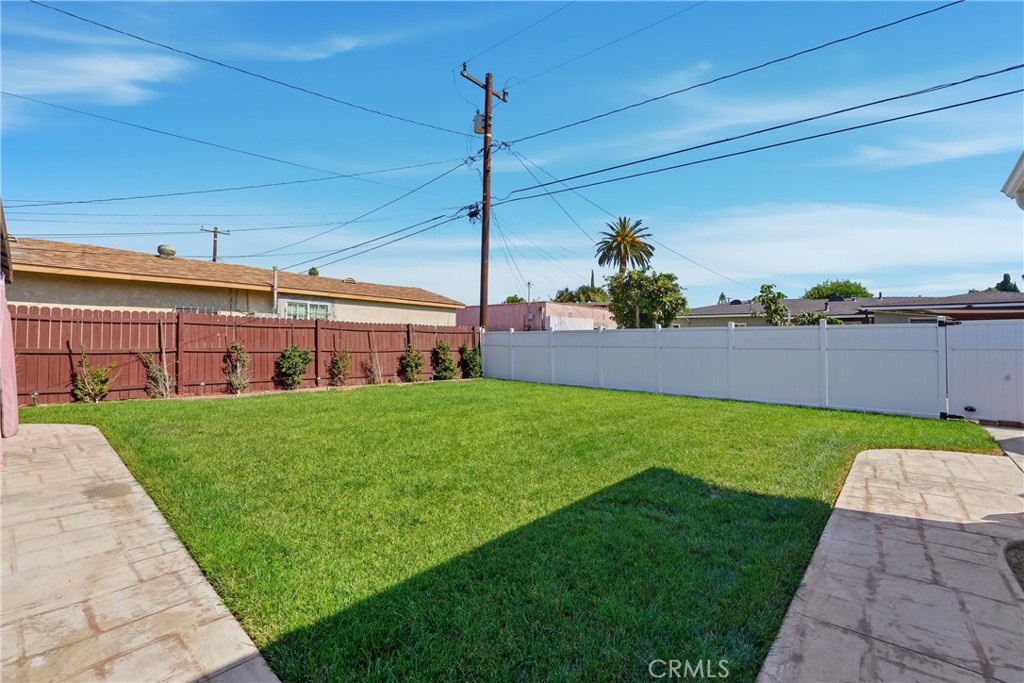 11340 Virginia Street Lynwood, CA 90262 - Photo 39 of 53 a view of a house with a garden