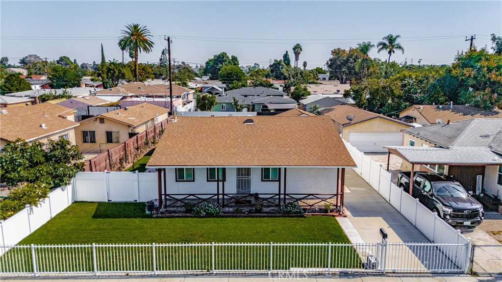 11340 Virginia Street Lynwood, CA 90262 - Photo 42 of 53 a aerial view of a house with a swimming pool