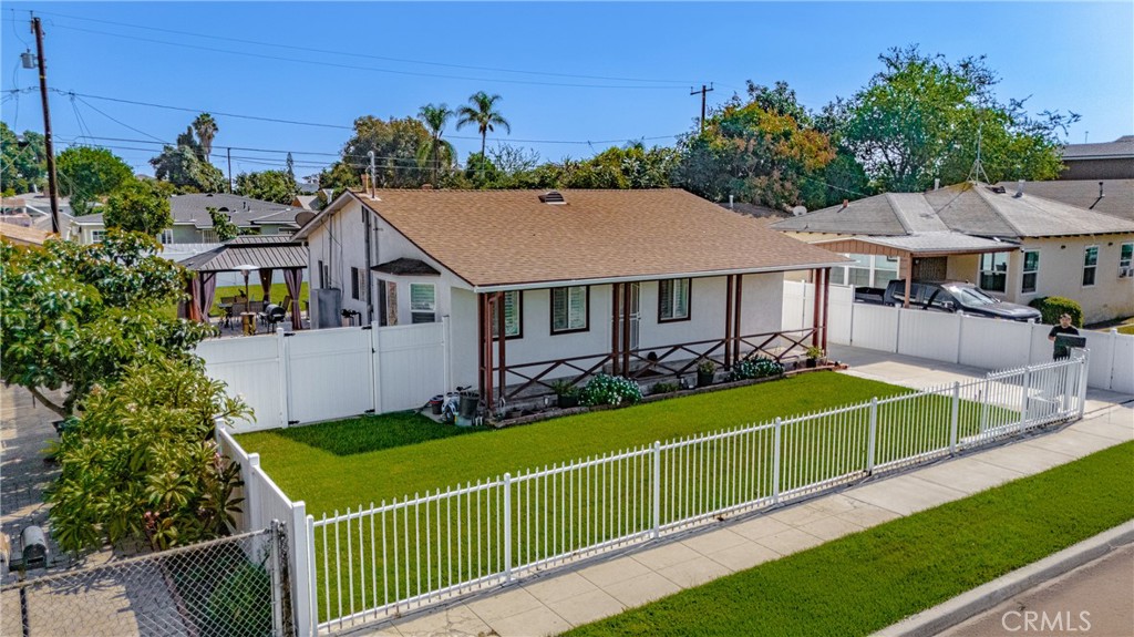 11340 Virginia Street Lynwood, CA 90262 - Photo 46 of 53 a view of an house with backyard space and garden
