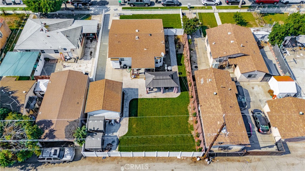 11340 Virginia Street Lynwood, CA 90262 - Photo 49 of 53 an aerial view of a house with a garden and lake view