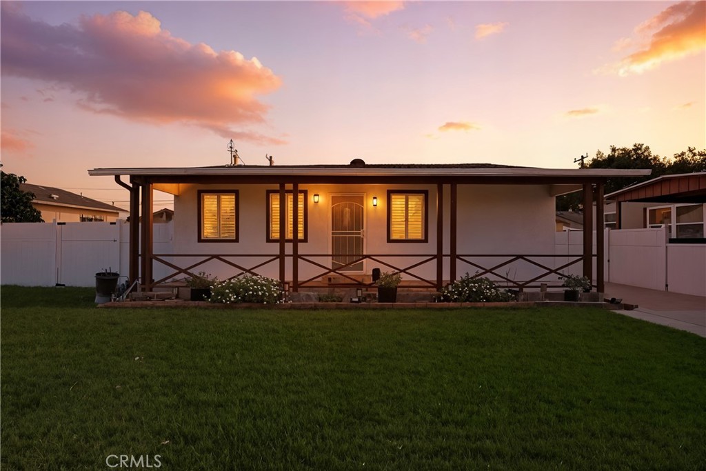 11340 Virginia Street Lynwood, CA 90262 - Photo 50 of 53 a backyard of a house with lots of green space and plants