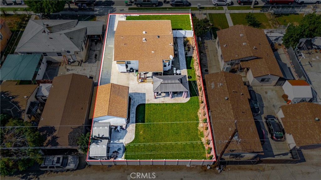 11340 Virginia Street Lynwood, CA 90262 - Photo 51 of 53 an aerial view of a house with a swimming pool