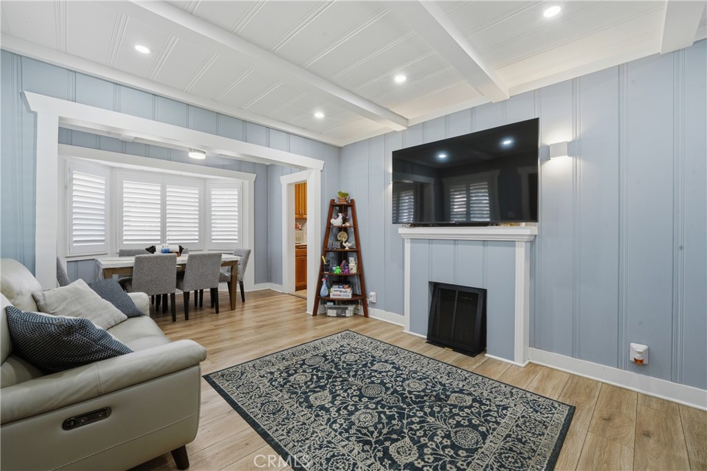 11340 Virginia Street Lynwood, CA 90262 - Photo 6 of 53 a living room with furniture and a fireplace
