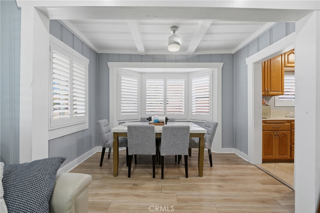 11340 Virginia Street Lynwood, CA 90262 - Photo 8 of 53 a view of a dining room with furniture window and wooden floor