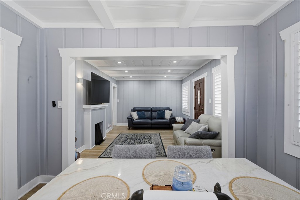 11340 Virginia Street Lynwood, CA 90262 - Photo 10 of 53 a living room with furniture and a flat screen tv