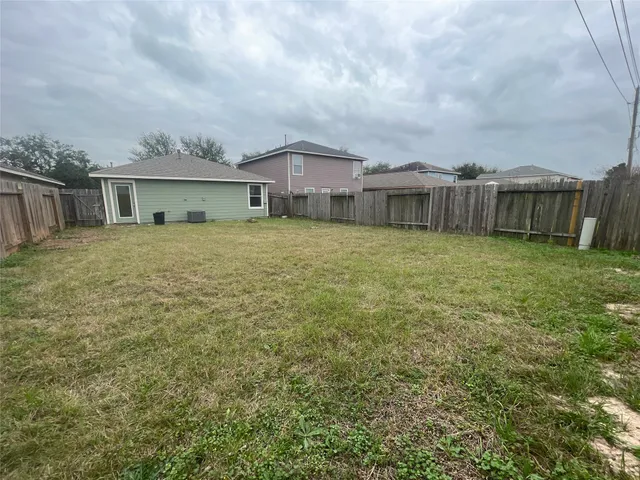 a house view with a garden space