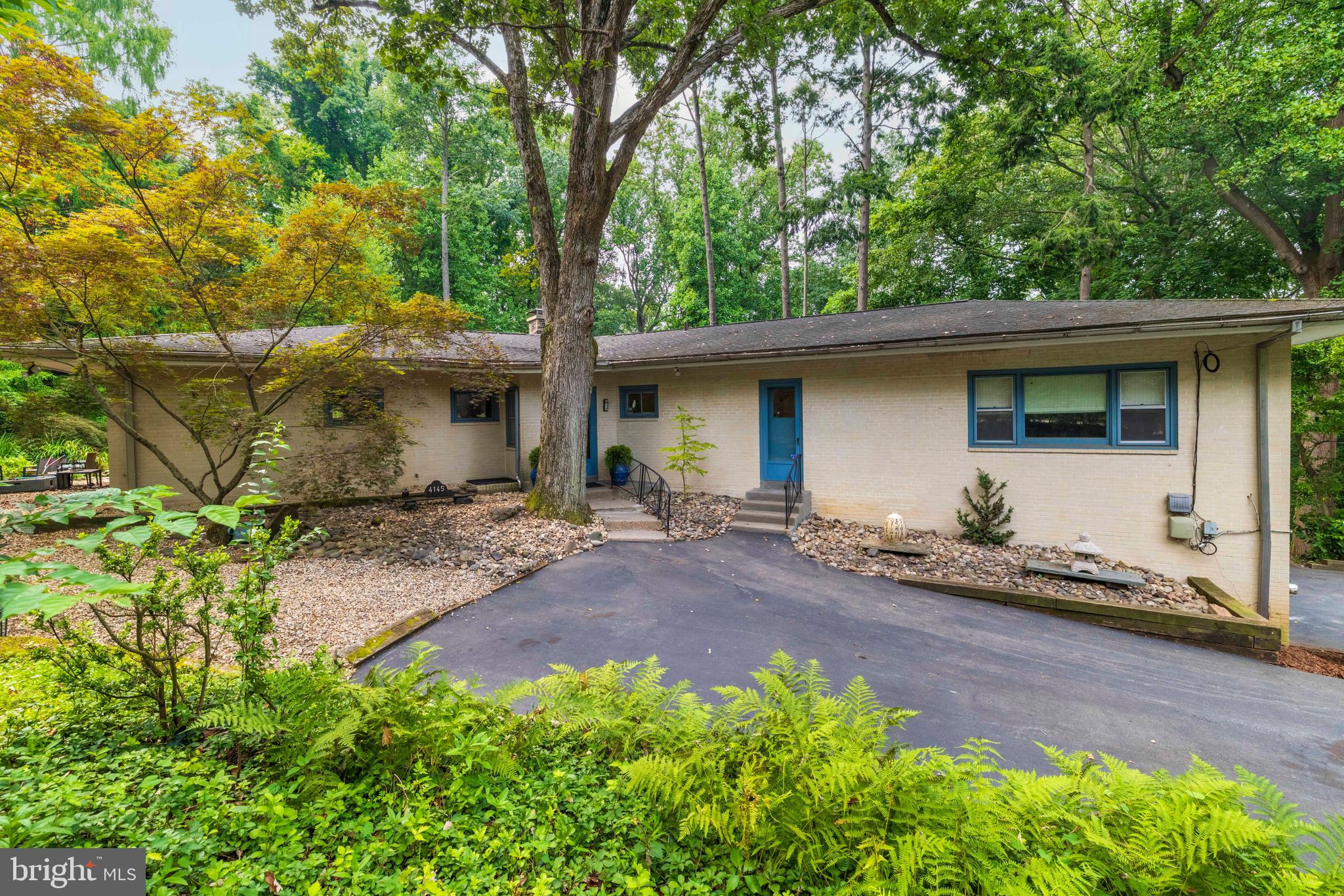 a front view of house with yard