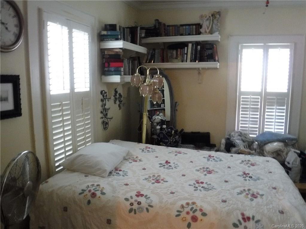 206 Callahan Street Rutherfordton, NC 28139 - Photo 18 of 48 a bedroom with a bed and a window