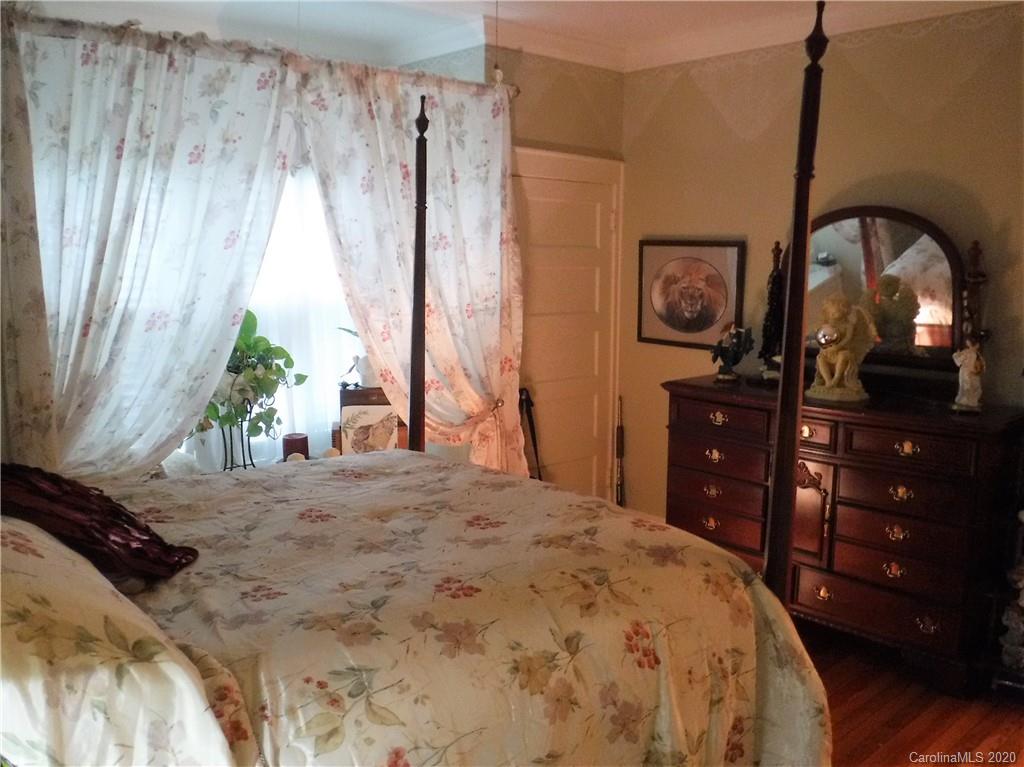 206 Callahan Street Rutherfordton, NC 28139 - Photo 21 of 48 a bedroom with a bed dresser and a window