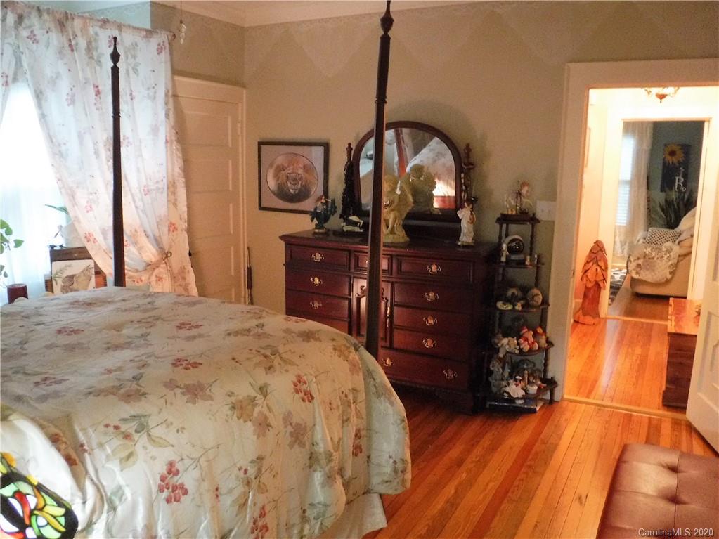 206 Callahan Street Rutherfordton, NC 28139 - Photo 22 of 48 a bedroom with a bed and a dresser