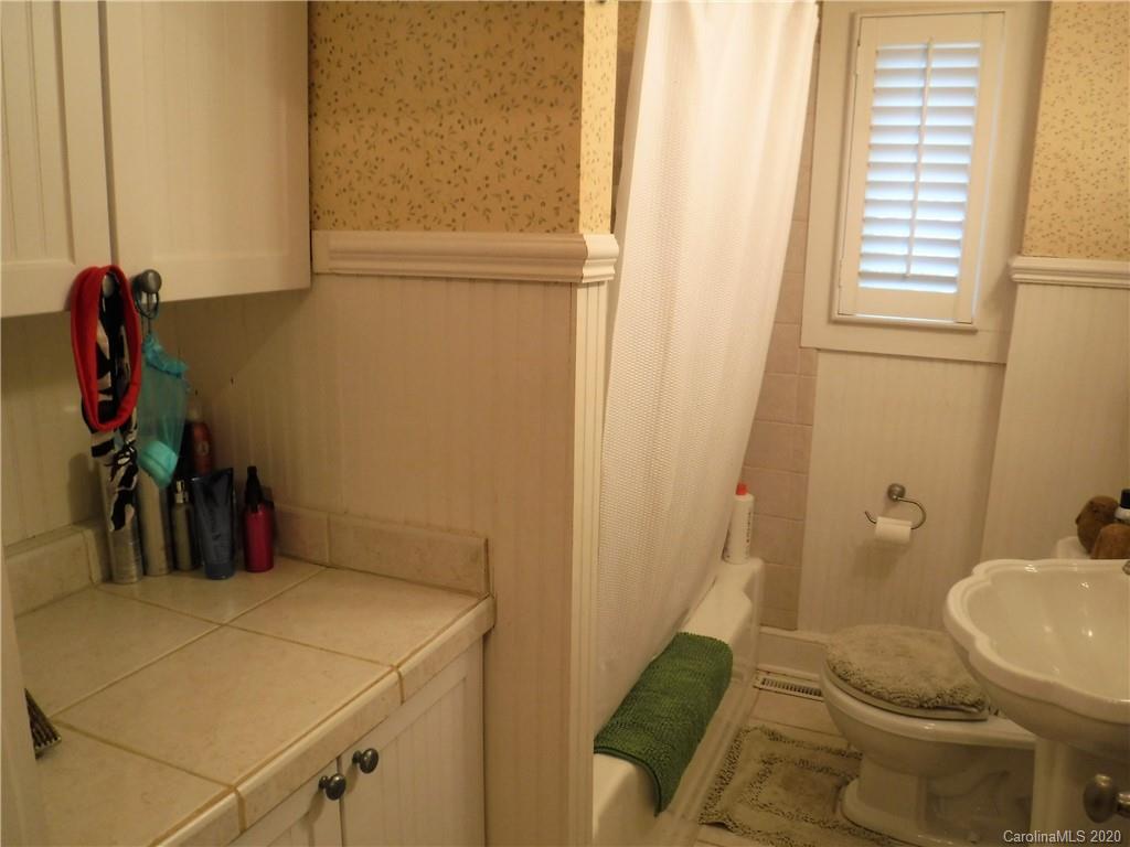 206 Callahan Street Rutherfordton, NC 28139 - Photo 25 of 48 a bathroom with a sink and toilet