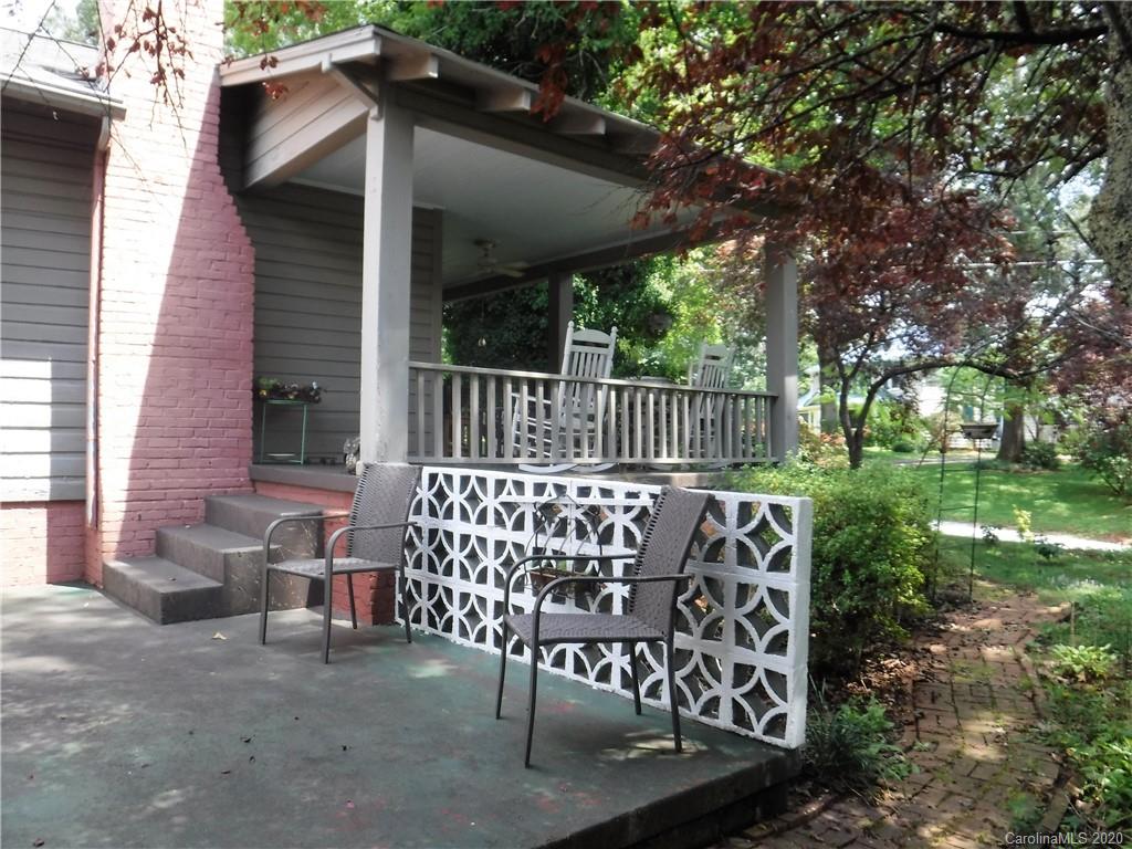 206 Callahan Street Rutherfordton, NC 28139 - Photo 34 of 48 a view of a wooden bench with chairs in the patio