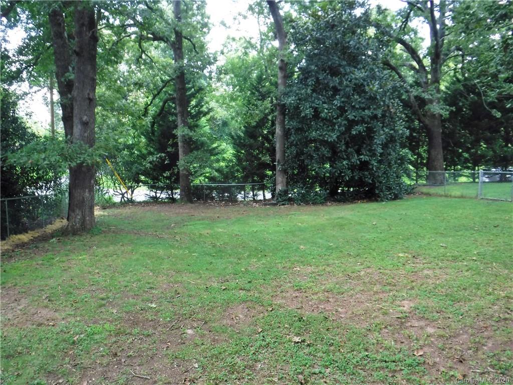 206 Callahan Street Rutherfordton, NC 28139 - Photo 42 of 48 a view of green field with trees in the background