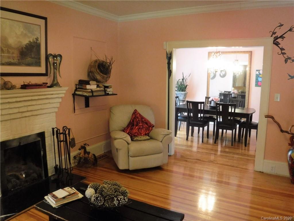206 Callahan Street Rutherfordton, NC 28139 - Photo 7 of 48 a living room with furniture and wooden floor