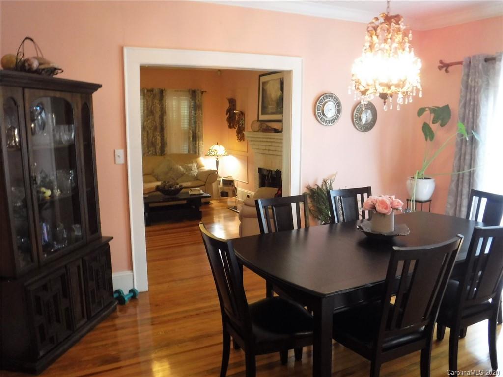 206 Callahan Street Rutherfordton, NC 28139 - Photo 9 of 48 a view of a dining room with furniture and wooden floor
