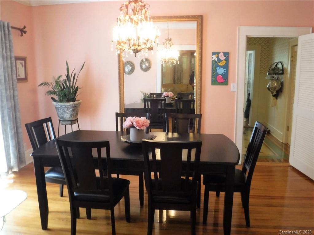 206 Callahan Street Rutherfordton, NC 28139 - Photo 10 of 48 a view of a dining room with furniture and chandelier
