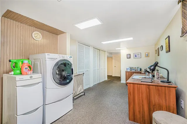 a storage room with washer and dryer