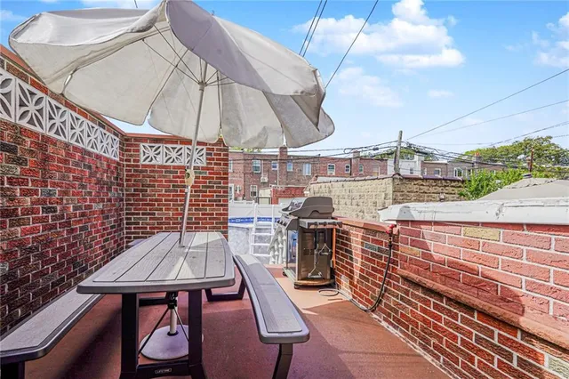 a view of a balcony with chairs