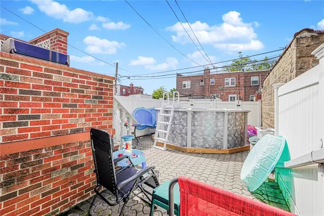 a view of a chairs and tables in the patio