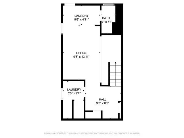 a picture of a bench in front of a wall