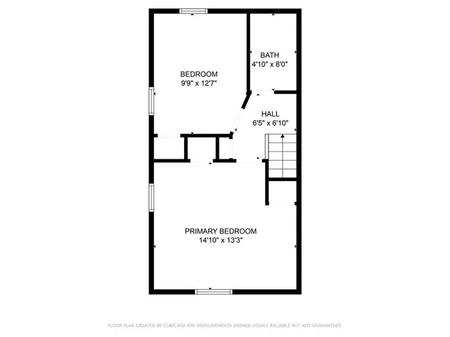 a picture of a bench in a white building