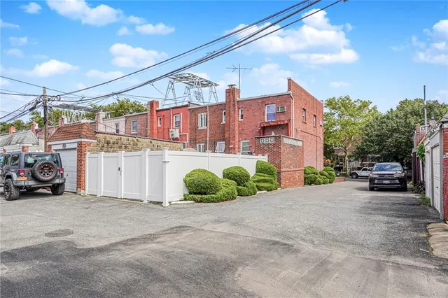 a view of a car parked in front of a building
