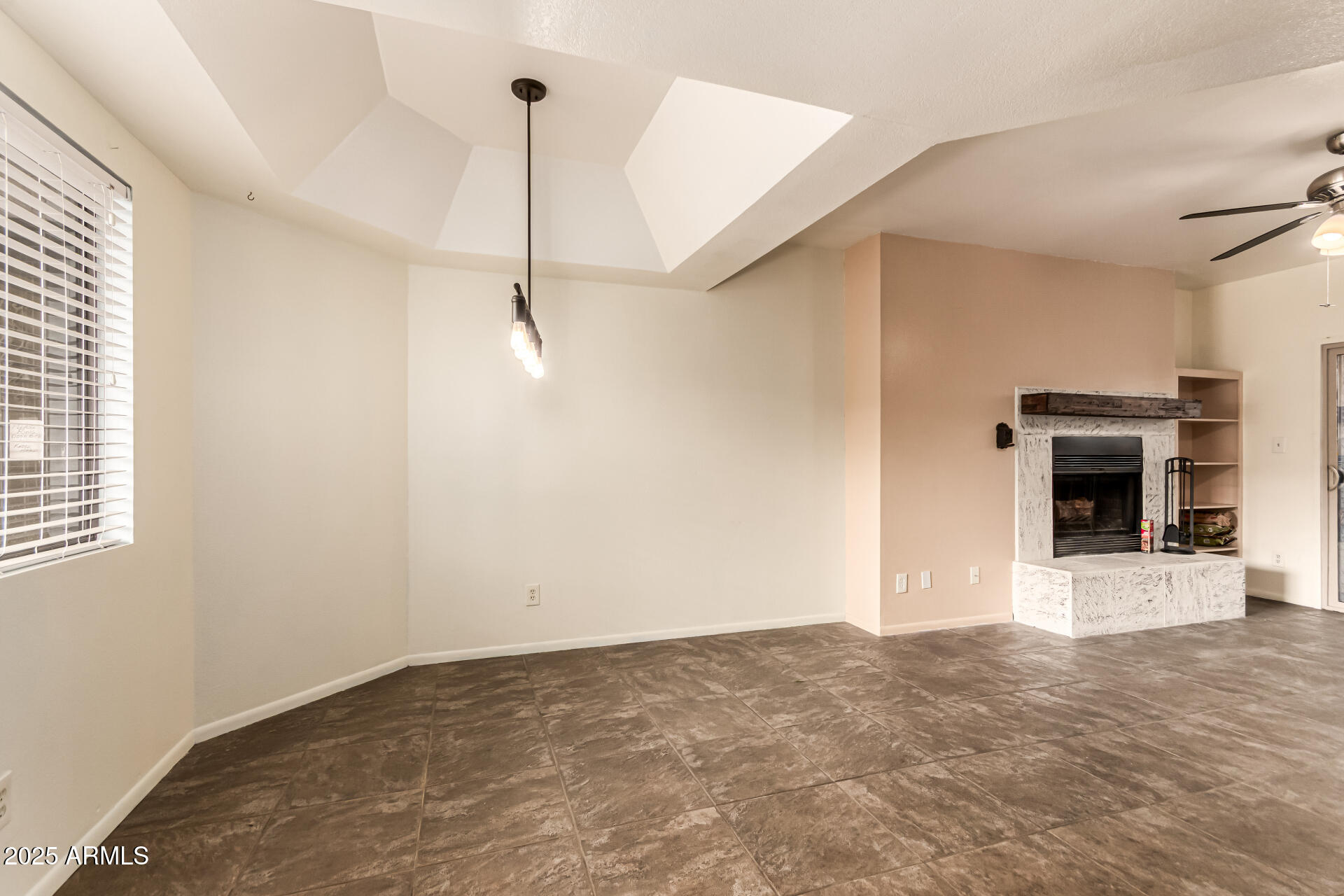 1352 East Highland Avenue, Unit 117 Phoenix, AZ 85014 - Photo 12 of 25 a view of a big room with closet and windows