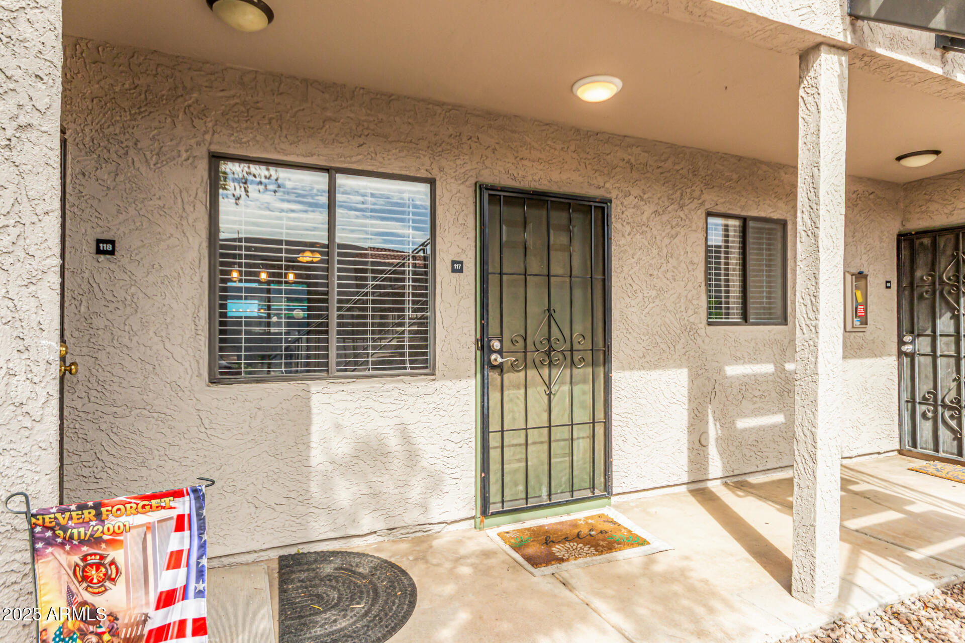 1352 East Highland Avenue, Unit 117 Phoenix, AZ 85014 - Photo 7 of 25 a view of a room that has a bed and a window
