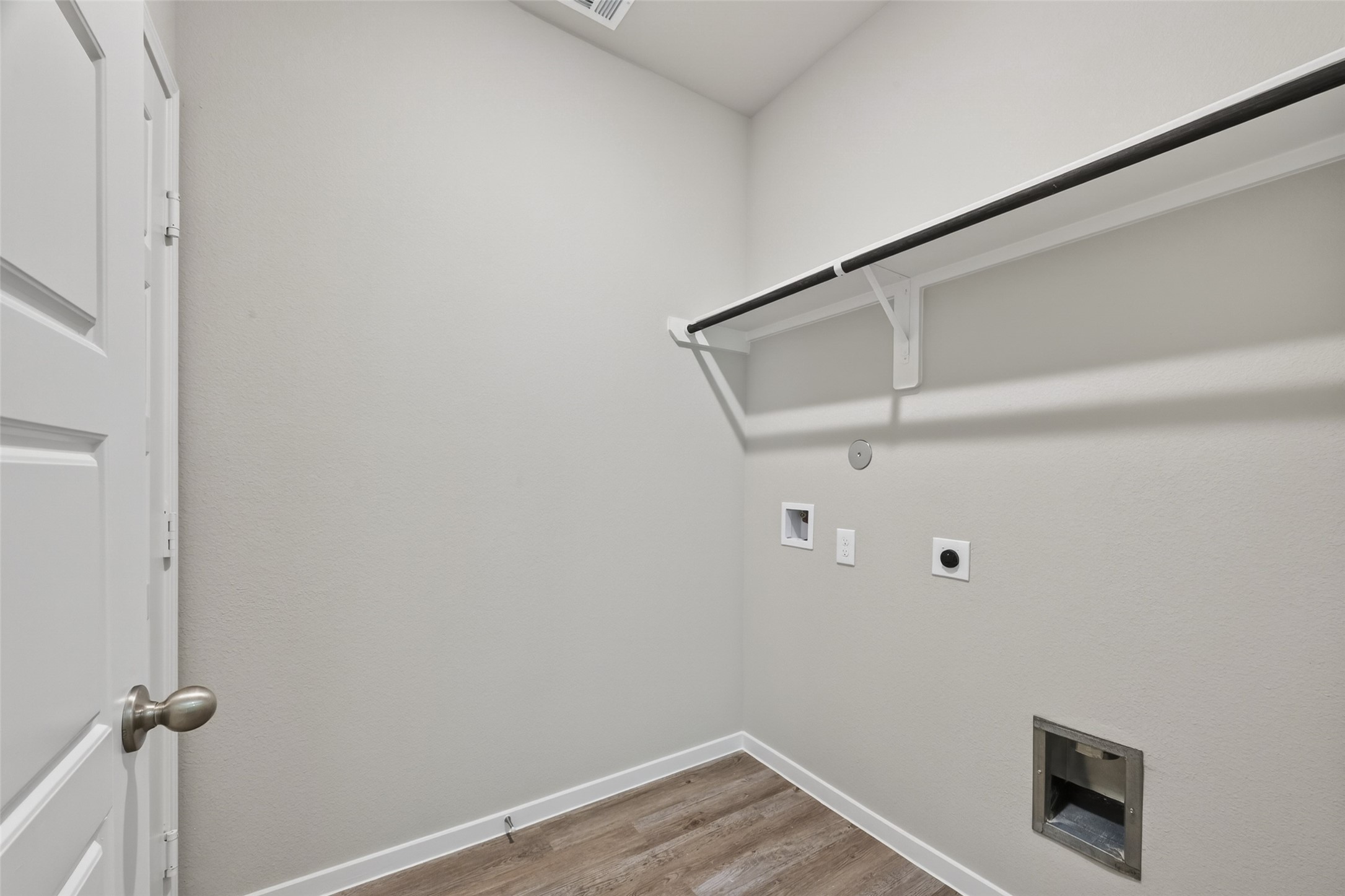 2107 Spring Hollow Drive Baytown, TX 77521 - Photo 18 of 42 a view of small space with racks on the wall